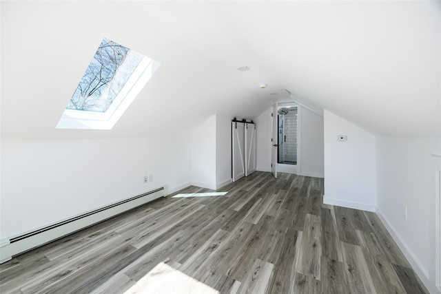 3 Holt Rd, Red Hook, NY 12571 - bonus room featuring a baseboard heating unit, a skylight, vaulted ceiling, wood finished floors, and baseboards