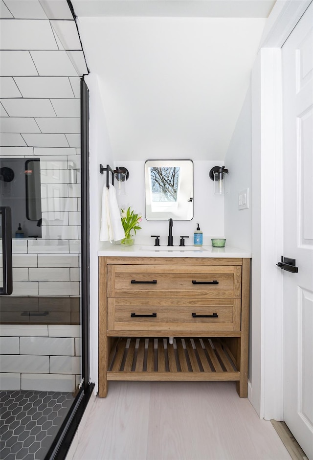3 Holt Rd, Red Hook, NY 12571 - bathroom featuring vaulted ceiling, a shower stall, and vanity