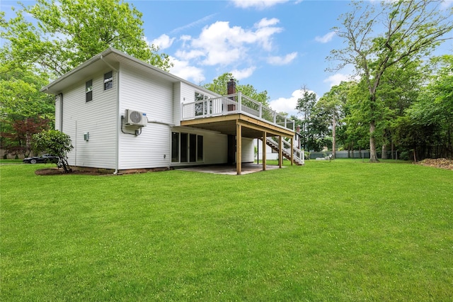 155 Brooklyn Ave, Huntington, NY 11743 - back of house with stairway, a wooden deck, a lawn, and a patio area