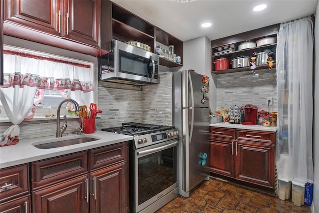 1257 E 87th St, Brooklyn, NY 11236 - kitchen featuring appliances with stainless steel finishes, open shelves, a sink, light countertops, and recessed lighting