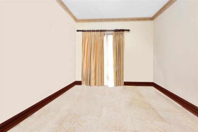 186-31 Radnor Rd, Jamaica Estates, NY 11432 - unfurnished room with ornamental molding and baseboards