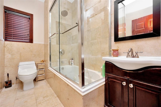 186-31 Radnor Rd, Jamaica Estates, NY 11432 - full bathroom featuring tile walls, toilet, tiled shower / bath, and vanity