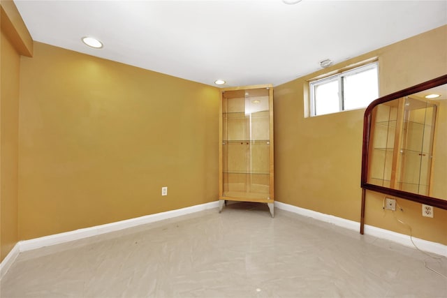 186-31 Radnor Rd, Jamaica Estates, NY 11432 - empty room featuring baseboards and recessed lighting