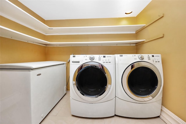 186-31 Radnor Rd, Jamaica Estates, NY 11432 - laundry area with independent washer and dryer and light tile patterned floors