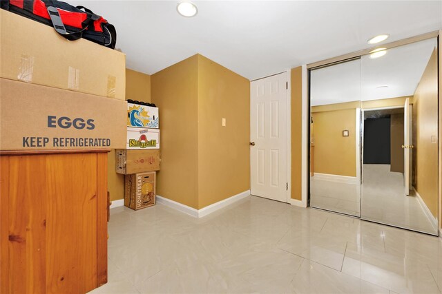 186-31 Radnor Rd, Jamaica Estates, NY 11432 - unfurnished bedroom with baseboards and recessed lighting