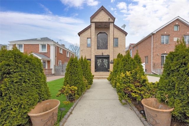 186-31 Radnor Rd, Jamaica Estates, NY 11432 - view of front of property featuring brick siding