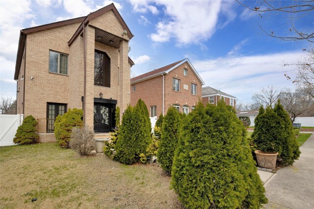 186-31 Radnor Rd, Jamaica Estates, NY 11432 - view of front of house featuring brick siding