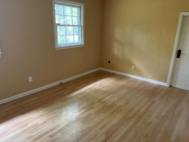 7 Beaver Dr, Locust Valley, NY 11560 - spare room featuring light wood-style flooring and baseboards