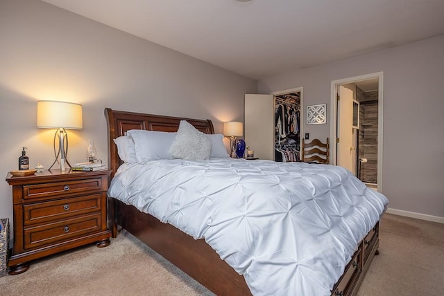 71 Frank Ct, Monroe, NY 10950 - bedroom featuring light colored carpet, a spacious closet, a closet, and connected bathroom