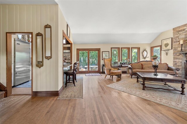 24 Brushwood Ct, East Islip, NY 11730 - living area with wood finished floors and lofted ceiling