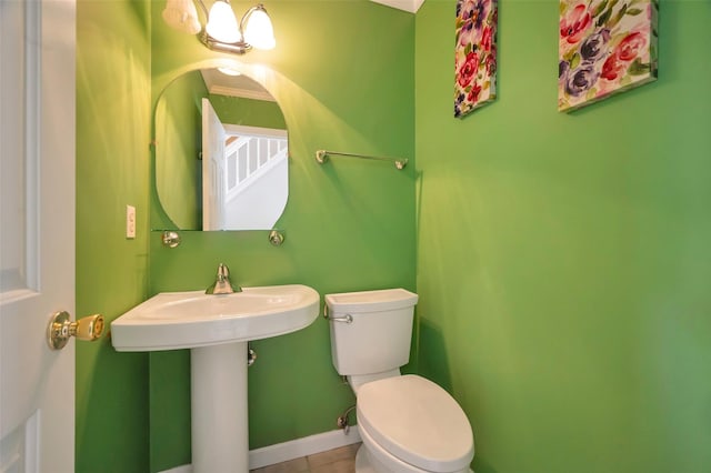 7 Ellbridge Ct, South Setauket, NY 11720 - bathroom with toilet, tile patterned floors, and baseboards