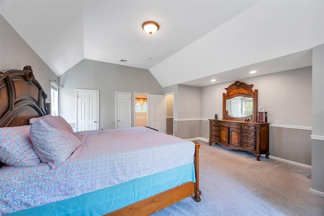 7 Ellbridge Ct, South Setauket, NY 11720 - bedroom featuring lofted ceiling, baseboards, and light colored carpet