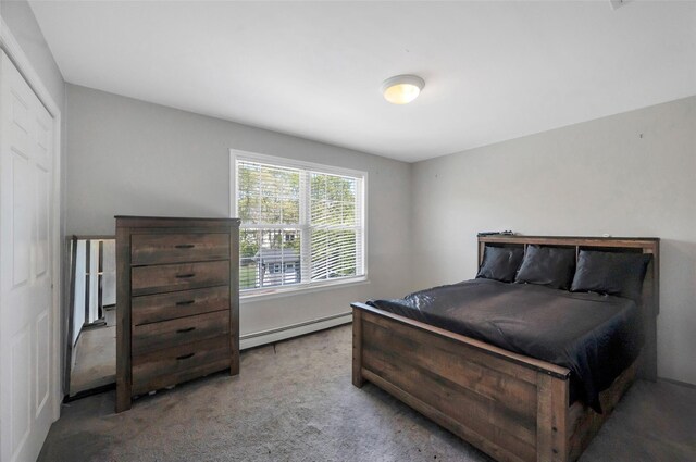 7 Ellbridge Ct, South Setauket, NY 11720 - carpeted bedroom featuring a baseboard heating unit
