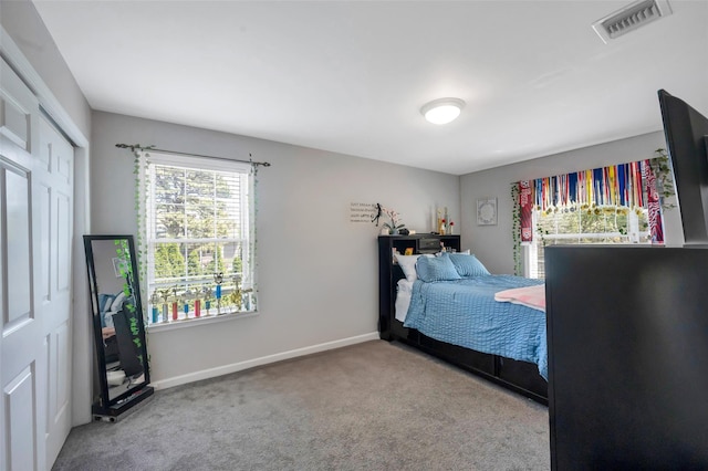 7 Ellbridge Ct, South Setauket, NY 11720 - carpeted bedroom featuring baseboards and a closet