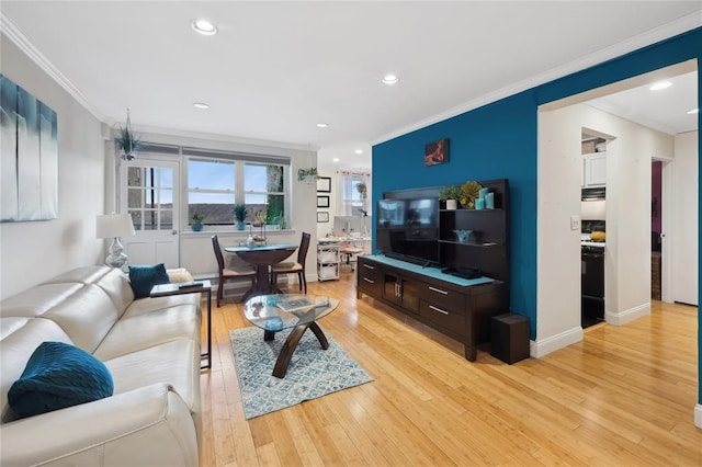 377 N Broadway Unit 402, Yonkers, NY 10701 - living area with crown molding, light wood-style flooring, recessed lighting, and baseboards