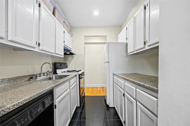377 N Broadway Unit 402, Yonkers, NY 10701 - kitchen featuring gas range, black dishwasher, a sink, recessed lighting, and white cabinets