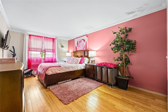 377 N Broadway Unit 402, Yonkers, NY 10701 - bedroom featuring crown molding, light wood-style floors, and baseboards