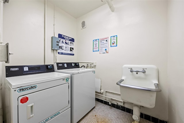 377 N Broadway Unit 402, Yonkers, NY 10701 - shared laundry featuring washer and dryer, tile patterned floors, and pet washing area