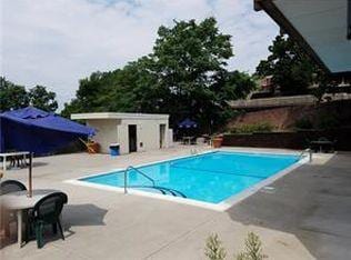 377 N Broadway Unit 402, Yonkers, NY 10701 - community pool featuring a patio area