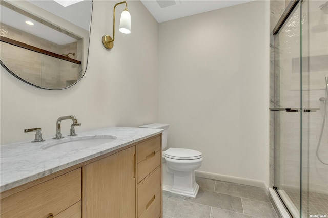 985 Track Ave, Cutchogue, NY 11935 - full bathroom with toilet, a shower stall, vanity, and baseboards