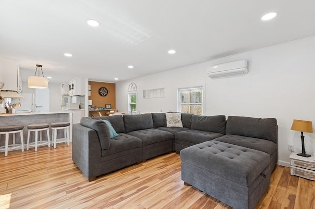 8 N Railroad Ave, Jamesport, NY 11901 - living room with a wall mounted air conditioner, light wood-style floors, and recessed lighting