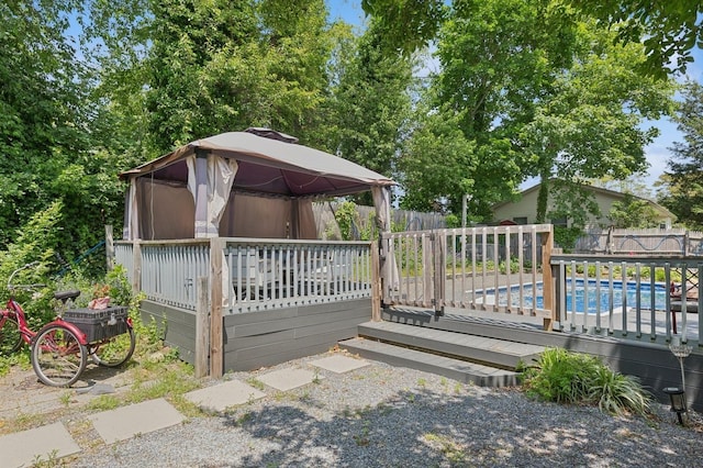 8 N Railroad Ave, Jamesport, NY 11901 - wooden terrace featuring a gazebo and a fenced backyard