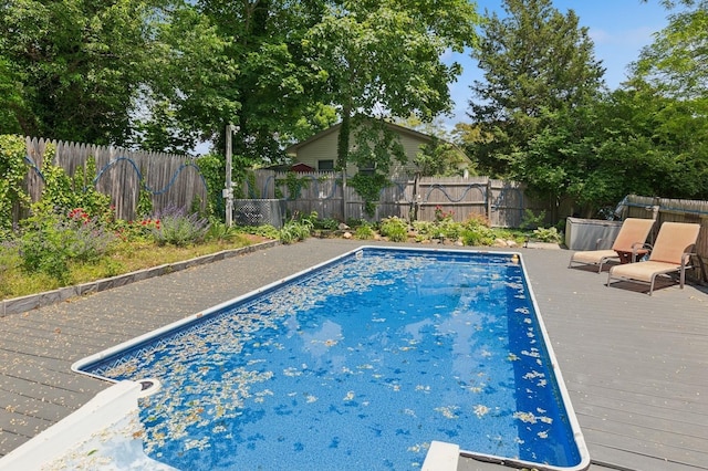 8 N Railroad Ave, Jamesport, NY 11901 - view of swimming pool with a fenced backyard and a deck