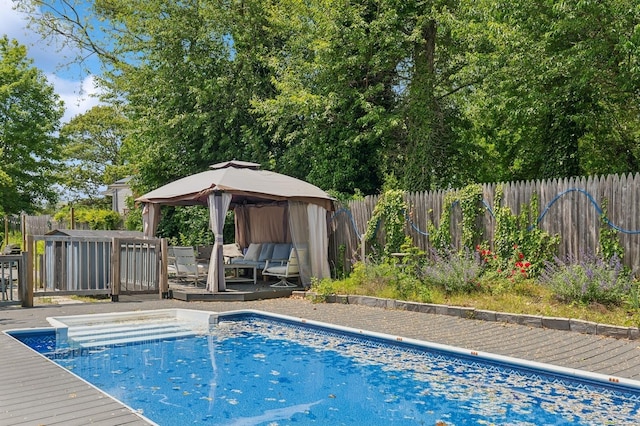 8 N Railroad Ave, Jamesport, NY 11901 - view of swimming pool with a gazebo, a deck, and a fenced backyard