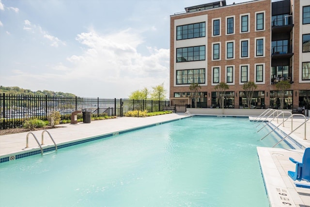 community pool with fence