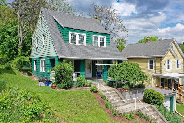24 Park St, Kingston, NY 12401 - view of front facade featuring covered porch, roof with shingles, a front yard, and a chimney