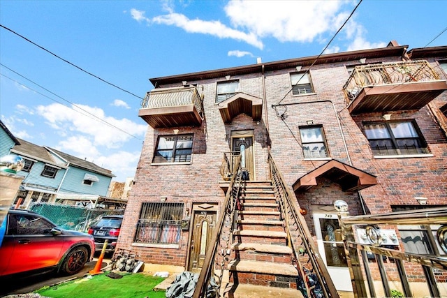 747 E 220th St, Bronx, NY 10467 - view of front of house featuring brick siding
