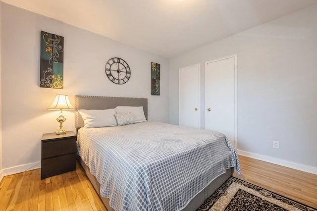 70-08 261th St Unit A1, Glen Oaks, NY 11004 - bedroom with baseboards and light wood-style flooring