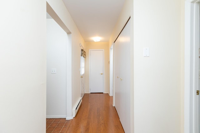 133 Revere Dr, Sayville, NY 11782 - hallway featuring baseboard heating and baseboards