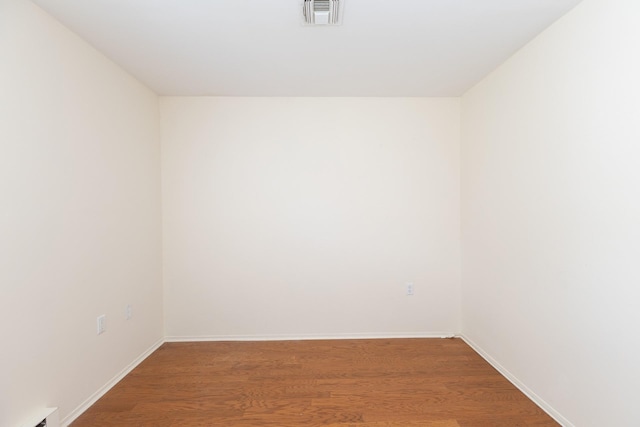 133 Revere Dr, Sayville, NY 11782 - spare room with wood finished floors and baseboards