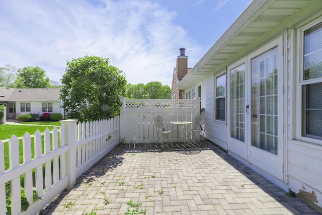 133 Revere Dr, Sayville, NY 11782 - view of patio / terrace with fence and french doors