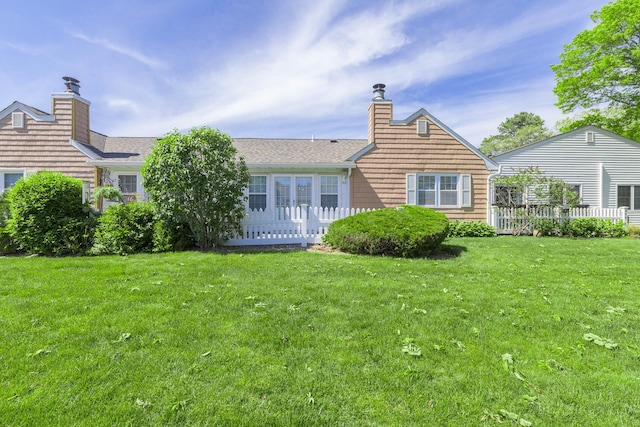 133 Revere Dr, Sayville, NY 11782 - back of property featuring a chimney and a yard