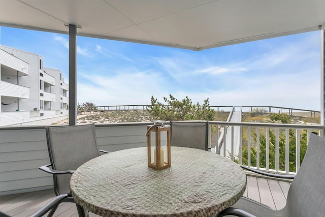 259 Dune Rd Unit 128, Westhampton Beach, NY 11978 - balcony with outdoor dining space