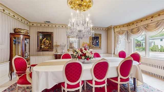 202 Broadway, Lawrence, NY 11559 - dining room featuring radiator, a chandelier, a decorative wall, light tile patterned floors, and crown molding