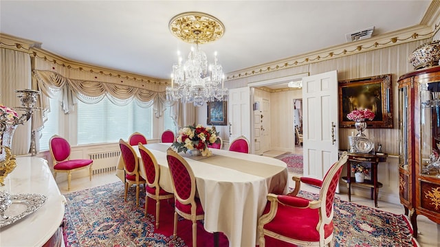 202 Broadway, Lawrence, NY 11559 - dining area featuring a chandelier, radiator, and crown molding
