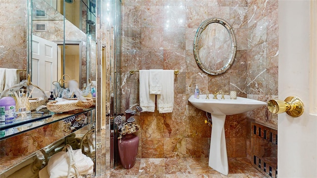 202 Broadway, Lawrence, NY 11559 - bathroom with tile walls and marble finish flooring