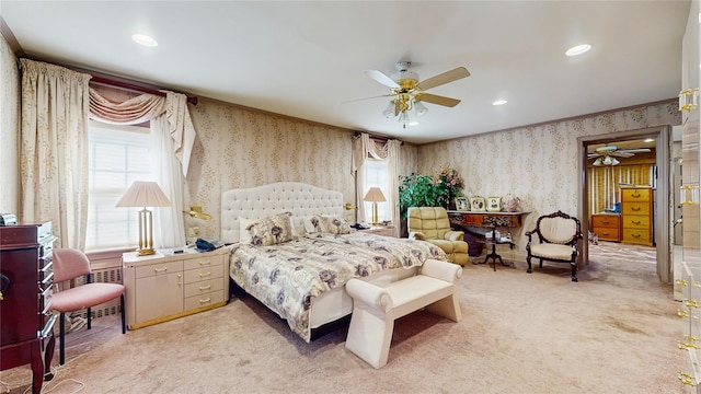202 Broadway, Lawrence, NY 11559 - bedroom with multiple windows, wallpapered walls, light carpet, recessed lighting, and ceiling fan