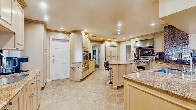202 Broadway, Lawrence, NY 11559 - kitchen with appliances with stainless steel finishes, a warming drawer, range hood, backsplash, and light stone counters