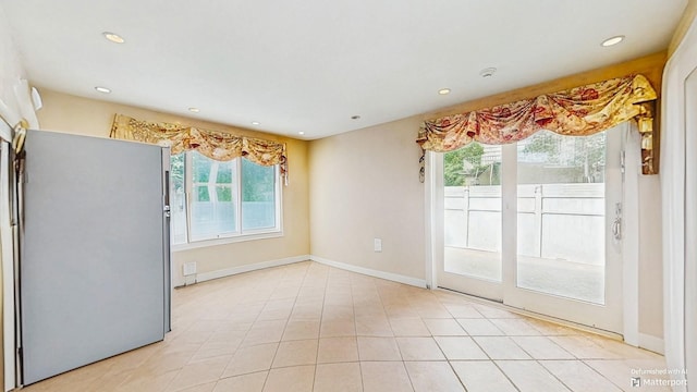 202 Broadway, Lawrence, NY 11559 - unfurnished dining area with healthy amount of natural light and recessed lighting