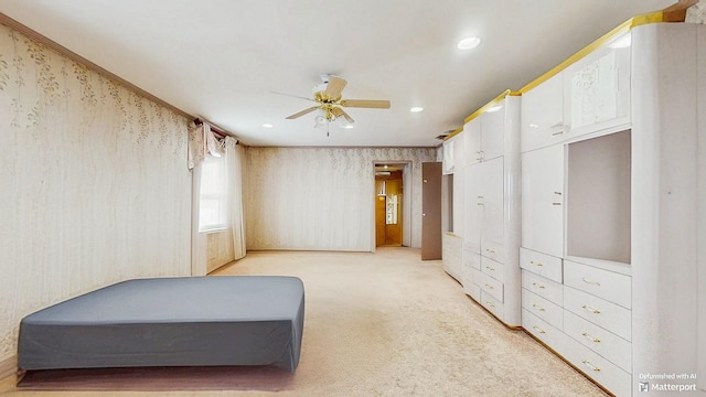 202 Broadway, Lawrence, NY 11559 - bedroom with light colored carpet, recessed lighting, a ceiling fan, and multiple closets