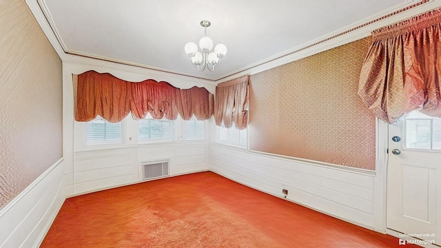 202 Broadway, Lawrence, NY 11559 - carpeted spare room with a chandelier, crown molding, and a wainscoted wall