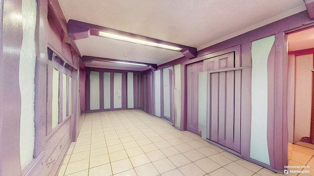 202 Broadway, Lawrence, NY 11559 - empty room with ornamental molding and light tile patterned flooring
