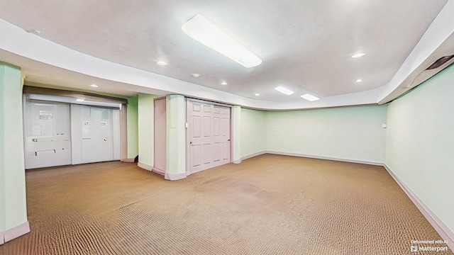 202 Broadway, Lawrence, NY 11559 - finished below grade area featuring recessed lighting and light carpet