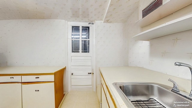 202 Broadway, Lawrence, NY 11559 - kitchen with light countertops and light tile patterned floors