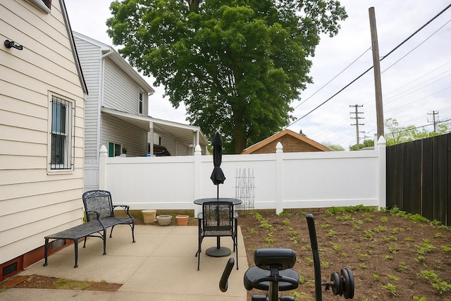 118-37 180th St, Jamaica, NY 11434 - fenced backyard with a patio area