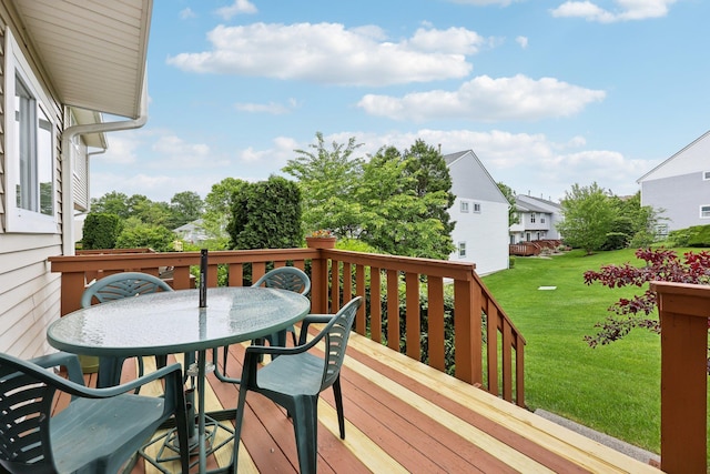 22 Knightsbridge Ct, Nanuet, NY 10954 - wooden terrace featuring outdoor dining area, a lawn, and a residential view